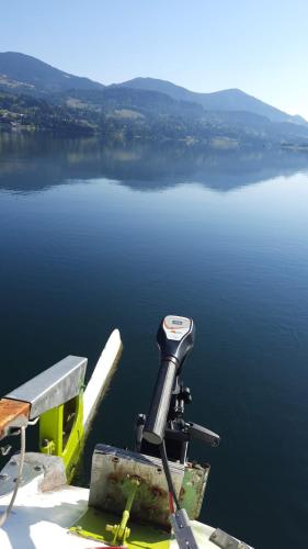 a view from the back of a boat on a body of water at Cabana Busuioc in Colibiţa