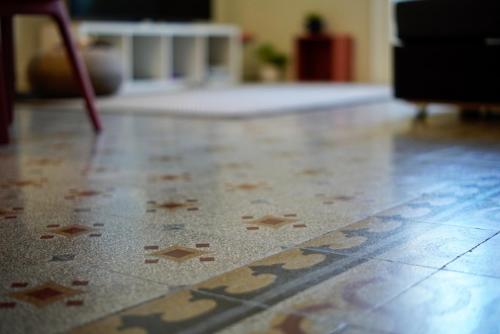a tile floor with stars on it in a room at Palazzo Polini Apartments in Sora