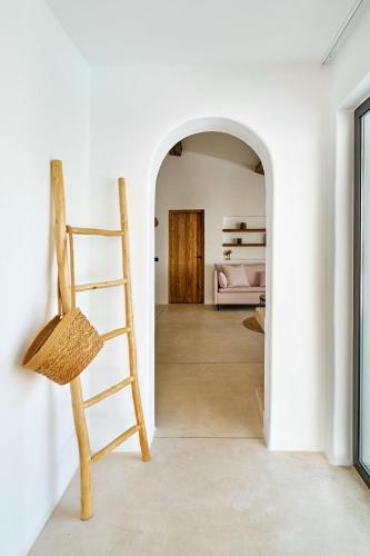 a room with a ladder and a bedroom at Villa Las Flores 46 in Playa Fañabe