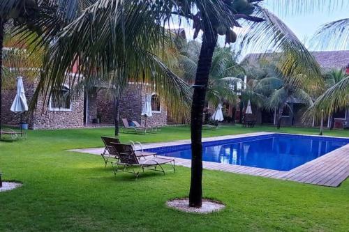 Kolam renang di atau dekat dengan Chalé La Fazenda