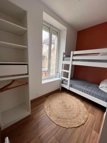 En plein coeur d'Arromanches tesisinde bir ranza yatağı veya ranza yatakları