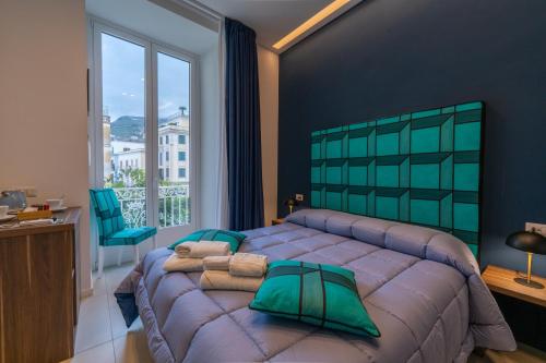 Postel nebo postele na pokoji v ubytování FRAN CITY SUITE