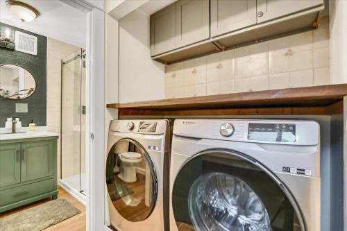 a laundry room with a washer and dryer at Dogwood Place in Johnson Landing