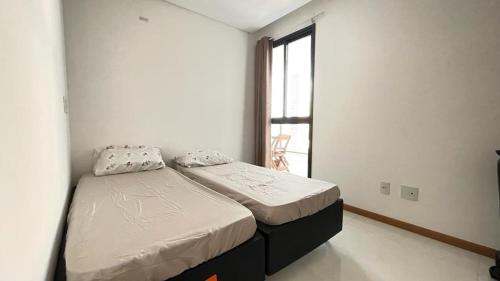 Postel nebo postele na pokoji v ubytování Apartamento mobiliado em Vila Velha