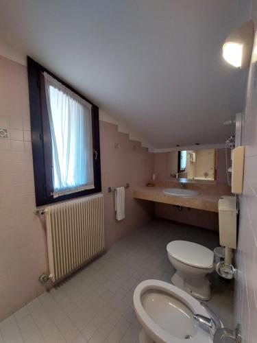 Koupelna v ubytování Albergo Alla Pineta