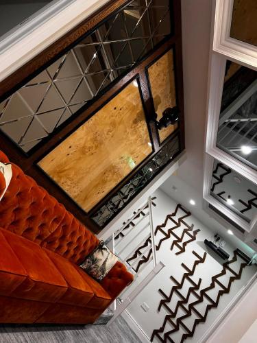 an overhead view of a room with a couch and a window at 53 Luxury Rooms in Maynooth