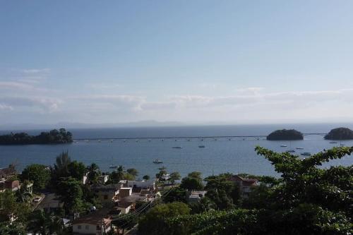 a view of a large body of water with boats in it at BLUE HOUSE OCEAN VIEW in Santa Bárbara de Samaná
