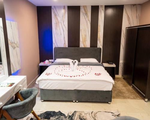 Postel nebo postele na pokoji v ubytování Ward Hotel Basra
