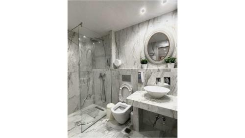 Ένα μπάνιο στο Myrto Rooms