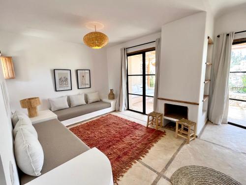 Χώρος καθιστικού στο Maison Flamingo