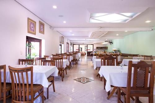 Restoran atau tempat lain untuk makan di Pousada das Videiras