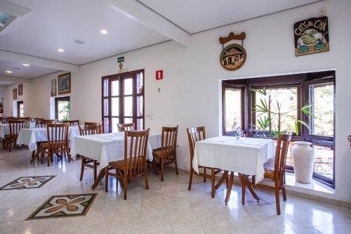 Un restaurante u otro lugar para comer en Pousada das Videiras