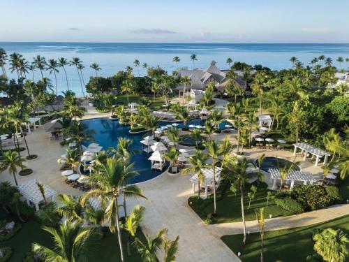 an aerial view of the resort with the ocean in the background at Hilton La Romana All-Inclusive Resort & Water Park Punta Cana in Bayahibe