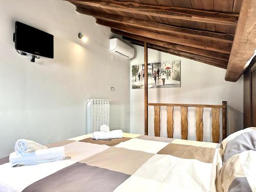 Ένα ή περισσότερα κρεβάτια σε δωμάτιο στο Casa Vetus