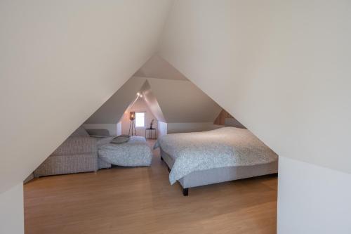 Postel nebo postele na pokoji v ubytování Villa Relax