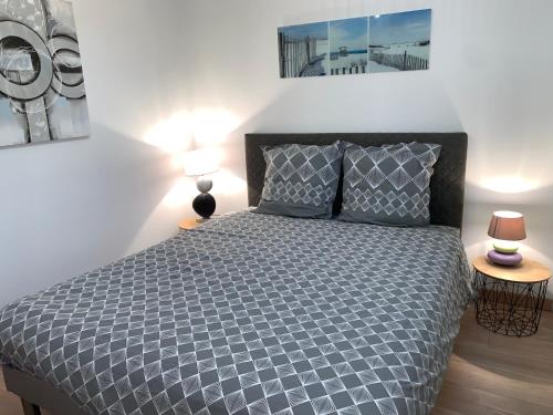 Katil atau katil-katil dalam bilik di Superbe duplex accès et vue mer, garage, linge fourni