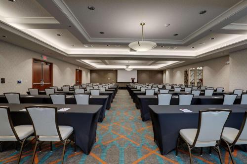 a room with rows of tables and chairs at Drury Plaza Hotel Nashville Downtown in Nashville