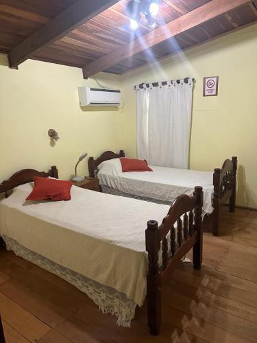 Postel nebo postele na pokoji v ubytování Cabaña eluney