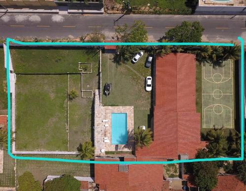 an aerial view of a house with a pool at Casa de Praia - Prainha in Aquiraz
