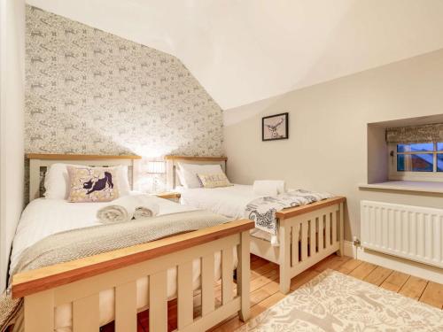 Ένα ή περισσότερα κρεβάτια σε δωμάτιο στο 3 Bed in Ellingham 90380