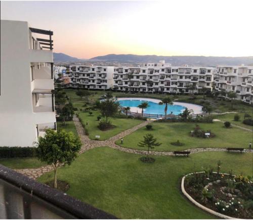 a view from the balcony of a apartment building at Mirador Golf Cabo Negro in Cabo Negro