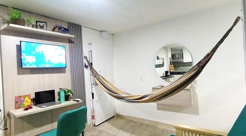 Televízia a/alebo spoločenská miestnosť v ubytovaní Apartamento Centro Histórico Santa Marta