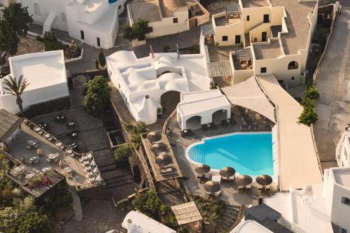 an aerial view of a villa with a swimming pool at Vedema, a Luxury Collection Resort, Santorini in Megalokhori