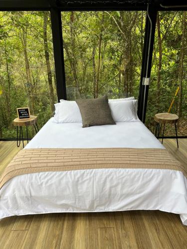 Postel nebo postele na pokoji v ubytování Silvery Refugio Natural
