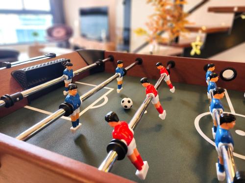 a group of legos playing a game of soccer at Loft Suite Central City 2BR JB CIQ 7Pax in Johor Bahru