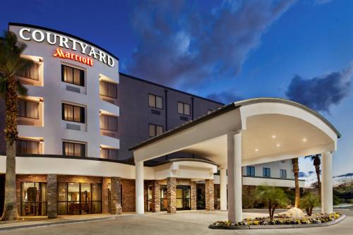 a rendering of a hotel with a building at Courtyard By Marriott Las Vegas Stadium Area in Las Vegas