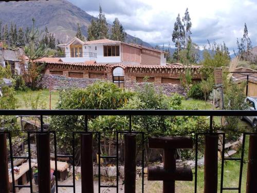 a view of a house from a balcony at Casa Corazao in Urubamba