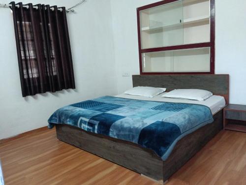 Кровать или кровати в номере Palms View Villa Home Stay