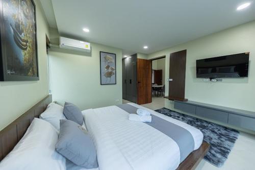Katil atau katil-katil dalam bilik di ขนอม คิริณณ์ Khanom Kirin Private Pool Villa