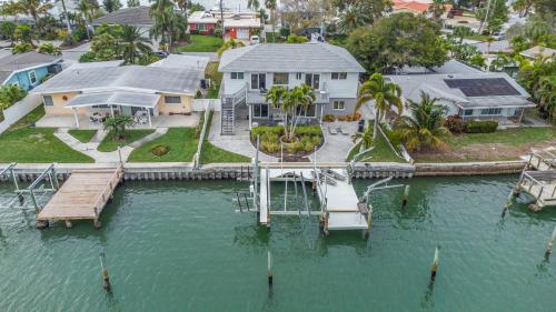 an aerial view of a house with a dock at Villa Azule in Clearwater Beach