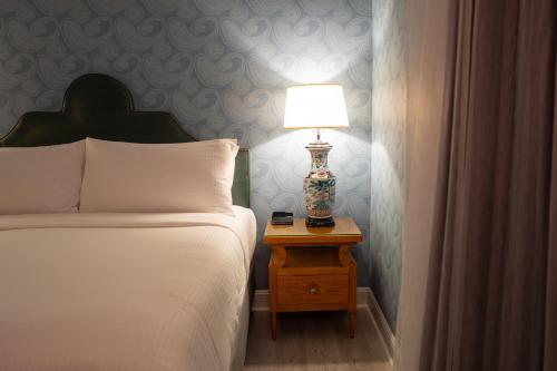 Ένα ή περισσότερα κρεβάτια σε δωμάτιο στο Hotel Fiona