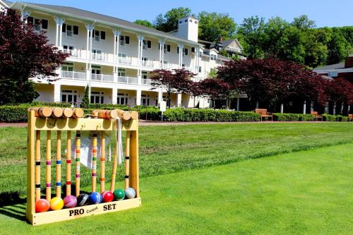 a display of baseball bats and balls on a field at Omni Bedford Springs Resort & Spa in Bedford