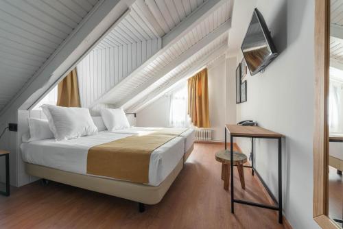 Postel nebo postele na pokoji v ubytování Hotel Viella