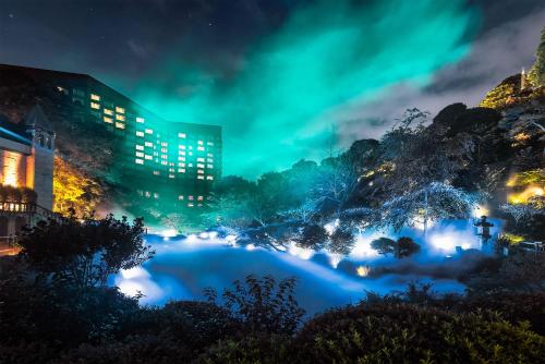 a view of a river at night at Hotel Chinzanso Tokyo in Tokyo