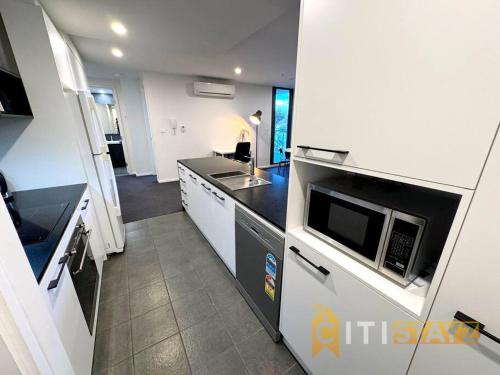 Kuchyň nebo kuchyňský kout v ubytování Fancy in Phillip - 2bd 2bth Apt!
