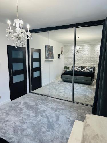 Posteľ alebo postele v izbe v ubytovaní Rynek Apartament