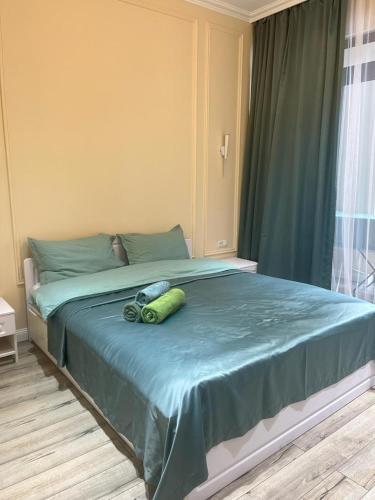 Llit o llits en una habitació de ЖК RIVERSIDE 3