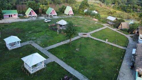 an aerial view of a camping field with tents at Wood Town Resort in Kharem