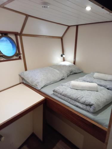 two beds in the back of a boat at Mps Holland in Amsterdam