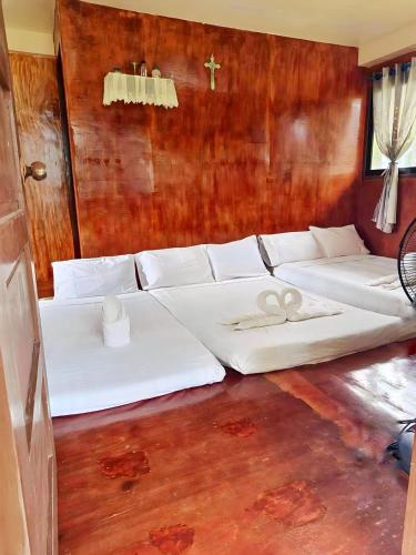 Ruang duduk di Camotes Palanas Beach Stay