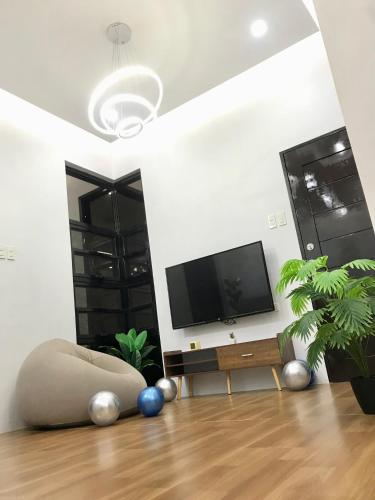 TV a/nebo společenská místnost v ubytování Tiny House Air BnB