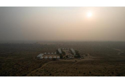 an aerial view of a group of tents in a field at Prince Desert Camp in Sām