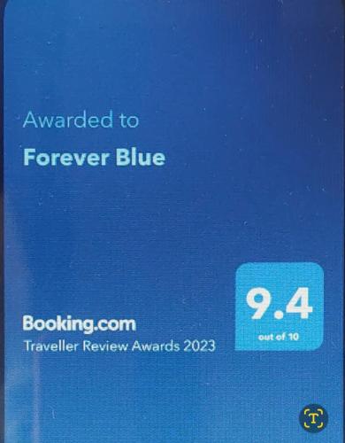a blue sign that says awarded to forever blue at Forever Blue in St Helena Bay