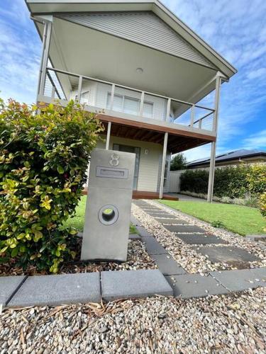 a house with a machine in front of it at Sofia’s Place in Aldinga Beach