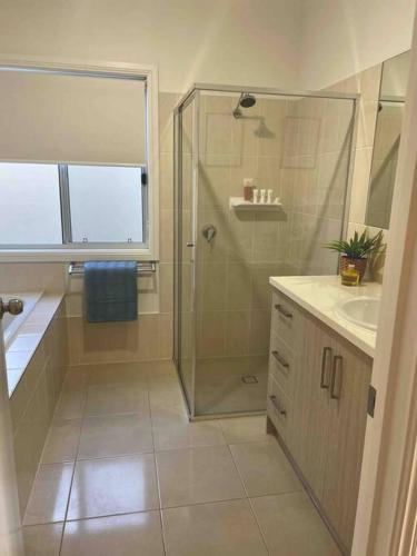 a bathroom with a shower and a sink at Sofia’s Place in Aldinga Beach