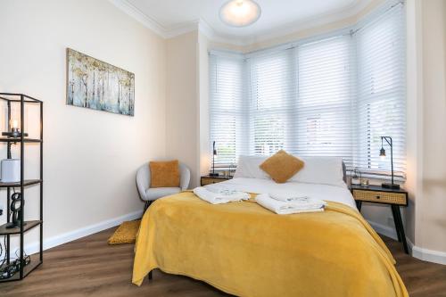 Ένα ή περισσότερα κρεβάτια σε δωμάτιο στο Quiet 1 Bedroom Flat, Perfect for Solo Travellers